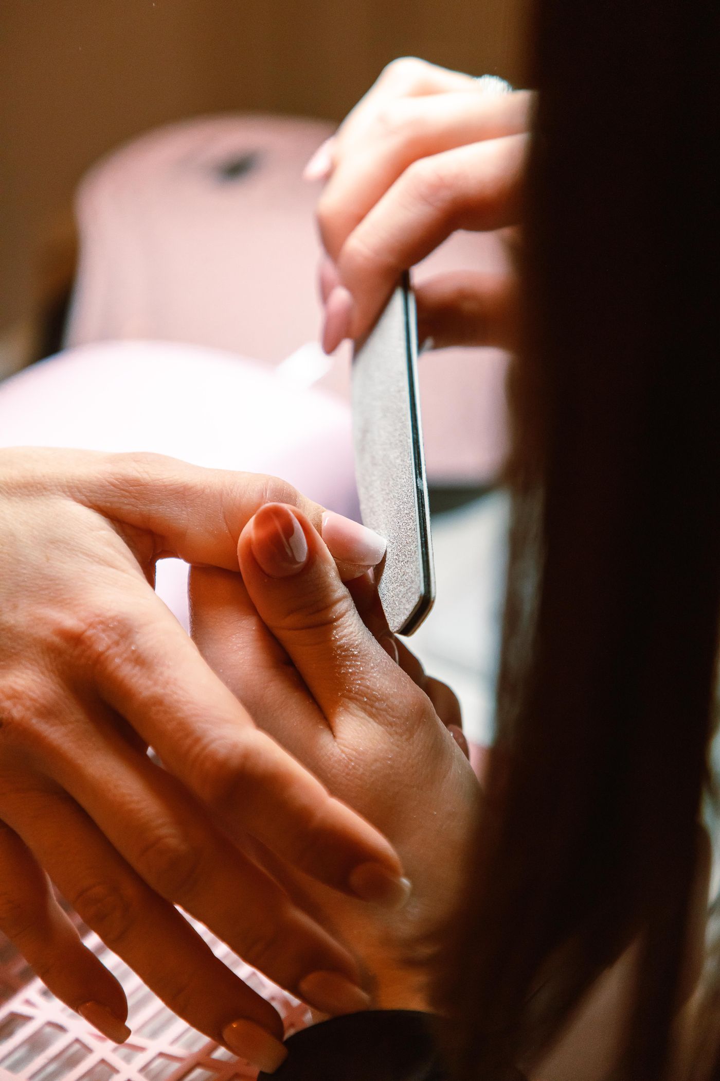 Manicure in progress at the salon